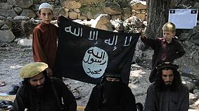 ISIL_fighters_in_Afghanistan,_with_their_commander,_Abu_Rashid_in_the_meddle.jpg